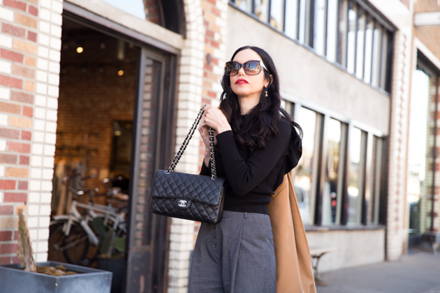 Camel cardigan + Chanel style cap toe pumps