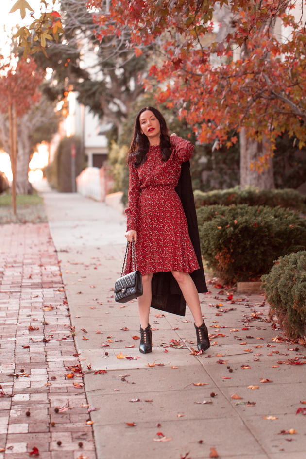 Winter Floral Dress styled by top LA fashion blog, Pretty Little Shoppers: image of a woman wearing an & Other Stories floral dress | & Other Stories, Perfect Winter Dress, And Other Stories, Winter Fashion, How to Style a dress in Winter, Wool Coat, Ankle Booties, Fall Fashion, Winter Styles, Shop till you drop, Fashion Influencer, Chanel Bag, Fall Trends, Who What Wearing, Fall Style, Fashion Blogger Style, Outfit Inspiration, Street Style, Street Fashion, OOTD Inspo, Street Style Stalking, Seasonal Style #andotherstories #fashionblogger #lafashionblogger #streetstyle #fallfashion #winterfashion #reddress #winterdress