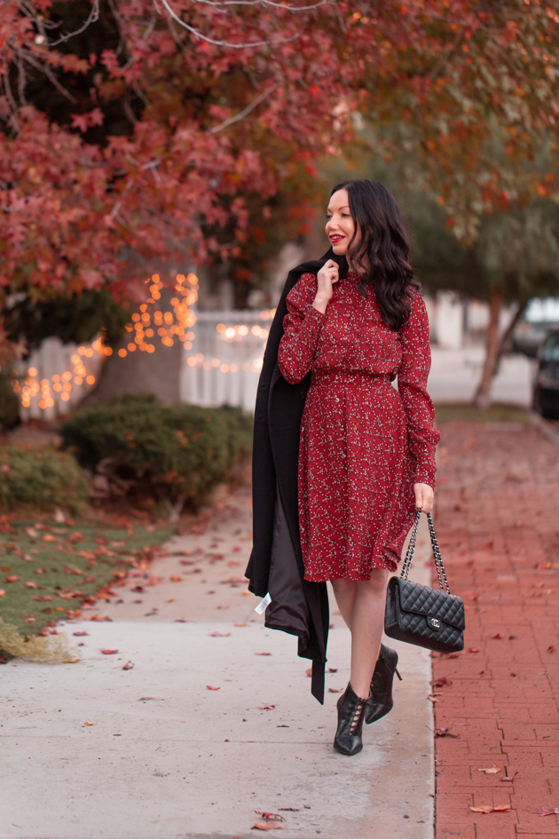 Winter Floral Dress styled by top LA fashion blog, Pretty Little Shoppers: image of a woman wearing an & Other Stories floral dress | & Other Stories, Perfect Winter Dress, And Other Stories, Winter Fashion, How to Style a dress in Winter, Wool Coat, Ankle Booties, Fall Fashion, Winter Styles, Shop till you drop, Fashion Influencer, Chanel Bag, Fall Trends, Who What Wearing, Fall Style, Fashion Blogger Style, Outfit Inspiration, Street Style, Street Fashion, OOTD Inspo, Street Style Stalking, Seasonal Style #andotherstories #fashionblogger #lafashionblogger #streetstyle #fallfashion #winterfashion #reddress #winterdress