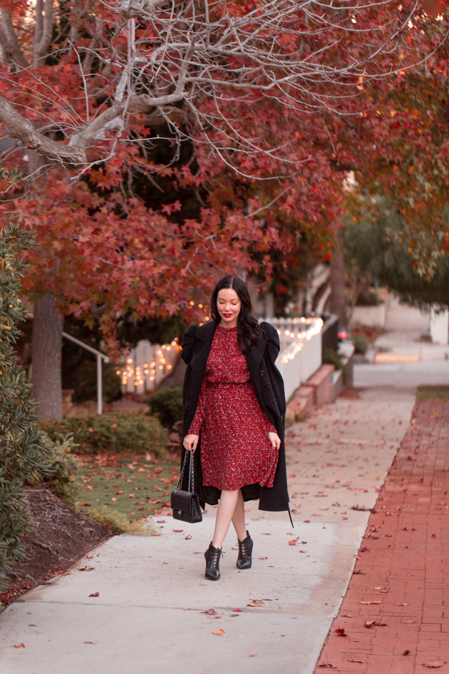 Winter Floral Dress styled by top LA fashion blog, Pretty Little Shoppers: image of a woman wearing an & Other Stories floral dress | & Other Stories, Perfect Winter Dress, And Other Stories, Winter Fashion, How to Style a dress in Winter, Wool Coat, Ankle Booties, Fall Fashion, Winter Styles, Shop till you drop, Fashion Influencer, Chanel Bag, Fall Trends, Who What Wearing, Fall Style, Fashion Blogger Style, Outfit Inspiration, Street Style, Street Fashion, OOTD Inspo, Street Style Stalking, Seasonal Style #andotherstories #fashionblogger #lafashionblogger #streetstyle #fallfashion #winterfashion #reddress #winterdress