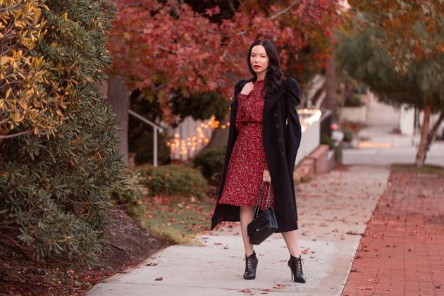 Winter Floral Dress styled by top LA fashion blog, Pretty Little Shoppers: image of a woman wearing an & Other Stories floral dress | & Other Stories, Perfect Winter Dress, And Other Stories, Winter Fashion, How to Style a dress in Winter, Wool Coat, Ankle Booties, Fall Fashion, Winter Styles, Shop till you drop, Fashion Influencer, Chanel Bag, Fall Trends, Who What Wearing, Fall Style, Fashion Blogger Style, Outfit Inspiration, Street Style, Street Fashion, OOTD Inspo, Street Style Stalking, Seasonal Style #andotherstories #fashionblogger #lafashionblogger #streetstyle #fallfashion #winterfashion #reddress #winterdress