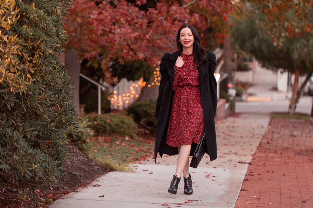 Winter Floral Dress styled by top LA fashion blog, Pretty Little Shoppers: image of a woman wearing an & Other Stories floral dress | & Other Stories, Perfect Winter Dress, And Other Stories, Winter Fashion, How to Style a dress in Winter, Wool Coat, Ankle Booties, Fall Fashion, Winter Styles, Shop till you drop, Fashion Influencer, Chanel Bag, Fall Trends, Who What Wearing, Fall Style, Fashion Blogger Style, Outfit Inspiration, Street Style, Street Fashion, OOTD Inspo, Street Style Stalking, Seasonal Style #andotherstories #fashionblogger #lafashionblogger #streetstyle #fallfashion #winterfashion #reddress #winterdress