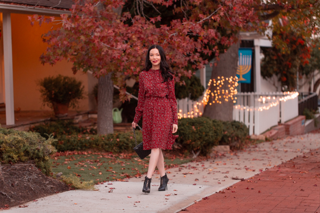 Winter Floral Dress styled by top LA fashion blog, Pretty Little Shoppers: image of a woman wearing an & Other Stories floral dress | & Other Stories, Perfect Winter Dress, And Other Stories, Winter Fashion, How to Style a dress in Winter, Wool Coat, Ankle Booties, Fall Fashion, Winter Styles, Shop till you drop, Fashion Influencer, Chanel Bag, Fall Trends, Who What Wearing, Fall Style, Fashion Blogger Style, Outfit Inspiration, Street Style, Street Fashion, OOTD Inspo, Street Style Stalking, Seasonal Style #andotherstories #fashionblogger #lafashionblogger #streetstyle #fallfashion #winterfashion #reddress #winterdress
