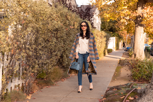 Statement coat styled by top Los Angeles fashion blog, Pretty Little Shoppers: image of a woman wearing an Urban Outfitters plaid wool statement coat. | It's All About the Coat, Plaid Coat, Urban Outfitters Coat, How to style a Statement Coat, Winter Fashion, Winter Style, Shop till you drop, Nuuly Rental Service, Joseph and Stacey, Anthropologie Blouse, Wool Coat, Who What Wearing, Mad About Plaid, Fashion Blogger Style, Outfit Inspiration, Street Style, Street Fashion, OOTD Inspo, Street Style Stalking, Seasonal Style #mynuuly #fashionblogger #lafashionblogger #streetstyle #Winterfashion #StatementCoat #WinterCoat