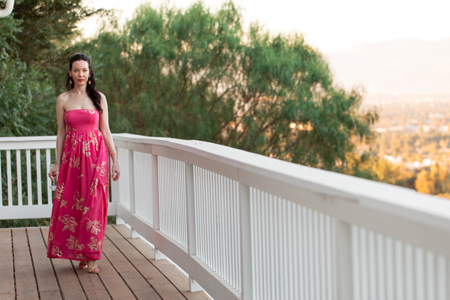 Date Night at Home Look - Pretty Little Shoppers Blog | Strapless Dress by popular L.A. fashion blog, Pretty Little Shoppers: image of a woman standing outside on a balcony and wearing a Free People Women's Baja Babe Midi Dress.