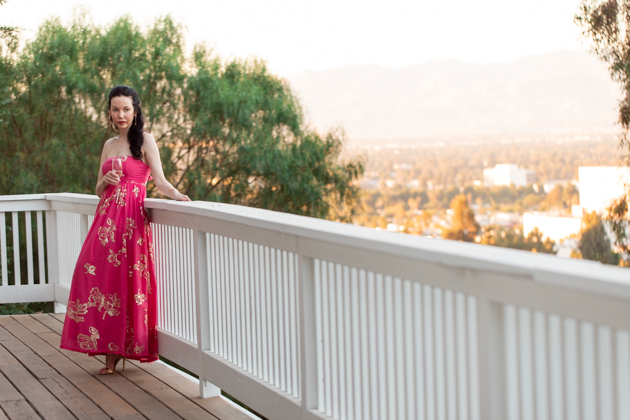 Date Night at Home: Strapless Dress | Strapless Dress by popular L.A. fashion blog, Pretty Little Shoppers: image of a woman standing outside on a balcony and wearing a Free People Women's Baja Babe Midi Dress.