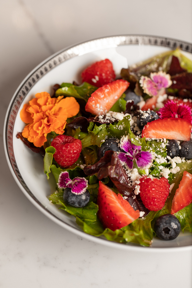 Berry and Goat Cheese Salad with Edible Flowers Recipe featured by top LA healthy lifestyle blogger, Pretty Little Shoppers