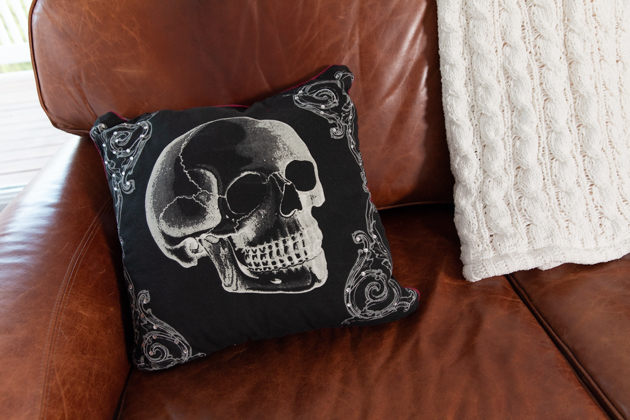 Halloween Skeleton Pillow |Cheese Platter by popular LA lifestyle blog, Pretty Little Shoppers: image of a black skeleton pumpkin. 