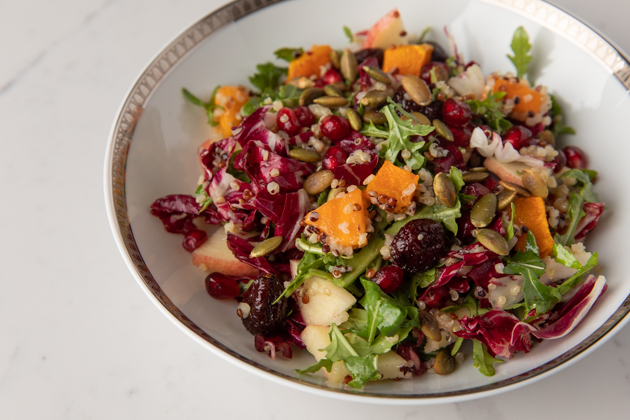 Fall Harvest Salad with Apple Cider Vinaigrette, Thanksgiving Recipe Ideas, Fall Salad with Butternut Squash and Quinoa, Fall Picnic Menu, Pretty Little Shoppers Blog, Los Angeles Lifestyle Blogger, How to Celebrate Thanksgiving During Quarantine #FallHarvestSalad #ThanksgivingSalad #ThanksgivingIdeas |Fall Harvest Salad by popular LA lifestyle blog, Pretty Little Shoppers: image of a fall harvest salad in a white and gold ceramic bowl. 