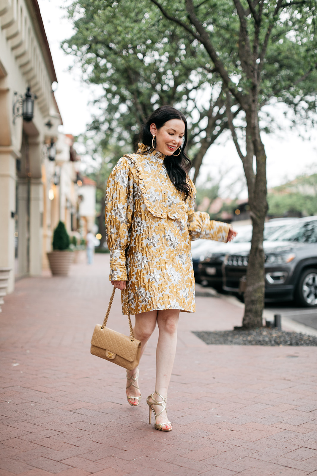 Sister Jane Cocktail Dress, Chanel bag, Jimmy Choo sandals, Ettika earrings, Highland Park Village Dallas | Cocktail Dress by popular Dallas fashion blog, Pretty Little Shoppers: image of a woman walking outside on a brick paved sidewalk and wearing a Sister Jane Cocktail Dress, Chanel Bag, Jimmy Choo Sandals, and Ettika earrings.