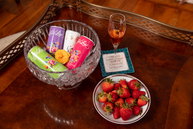 Casa Luigi Prosecco in glass Tiffany Bowl served with fresh strawberries | Online Vintage Clothing by popular Dallas fashion blog, Pretty Little Shoppers: image of a crystal bowl filled with Casa Luigi Prosecco next to a wine glass and a bowl of fresh strawberries. 