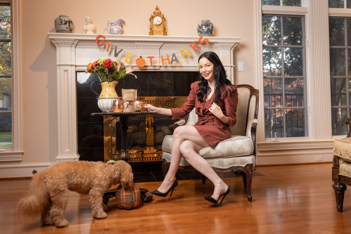 Thanksgiving Decor, Mini Goldendoodle puppy, Sandro wrap dress with black pumps, Holiday Moscow Mule