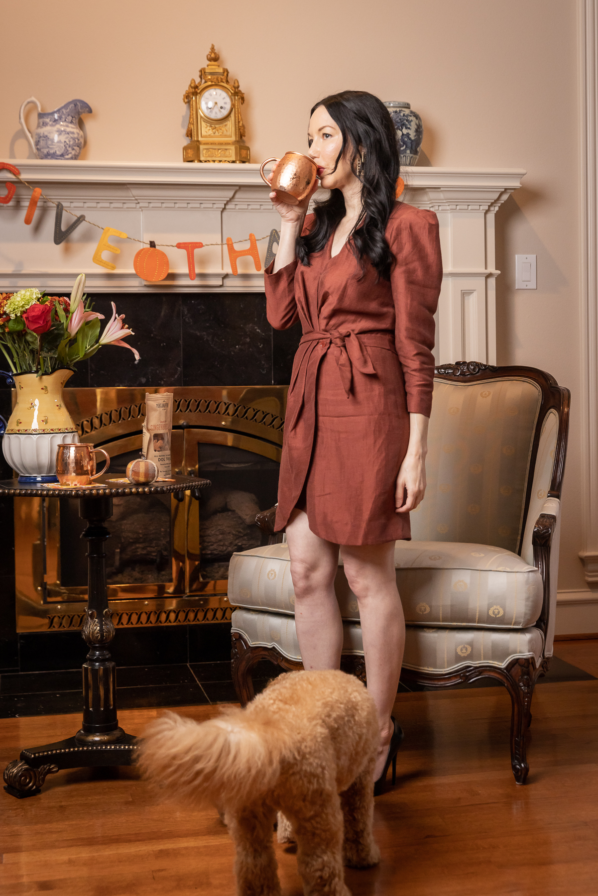 Thanksgiving Decor, Mini Goldendoodle puppy, Sandro wrap dress with black pumps, Holiday Moscow Mule