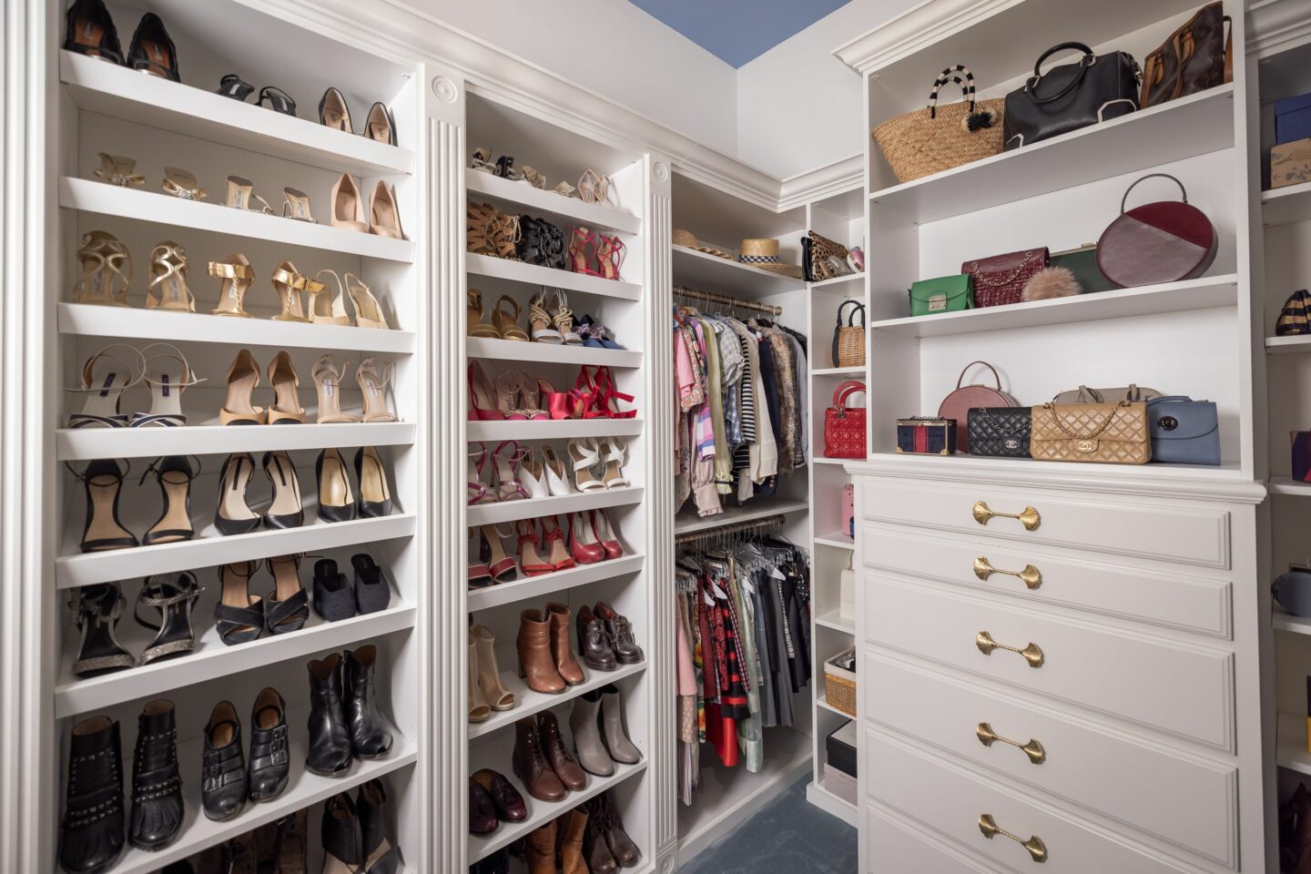 Shoe Wall in Hollywood Regency Closet by Closet Factory